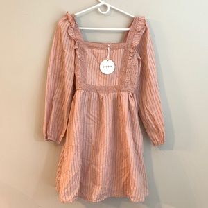 Pink lined dress with square neckline